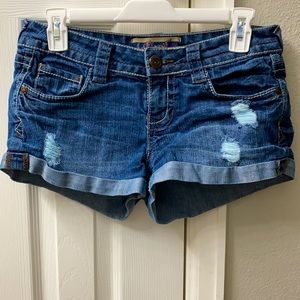 Distressed denim shorts